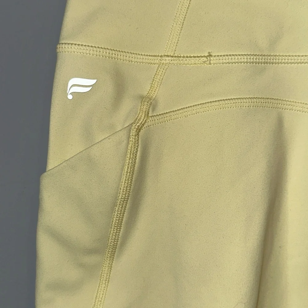 Fabletics Pale Yellow Bike Shorts with Side Pockets - Picture 5 of 6